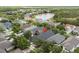 Beautiful aerial view of homes with a lovely pond in a desirable community at 14131 Paradise Tree Dr, Orlando, FL 32828