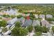 Beautiful aerial view of homes with a lovely pond in a desirable community at 14131 Paradise Tree Dr, Orlando, FL 32828
