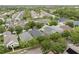 Desirable neighborhood featuring cozy homes with mature trees and well-maintained streets at 14131 Paradise Tree Dr, Orlando, FL 32828