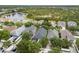 Beautiful aerial view of homes with a lovely pond in a desirable community at 14131 Paradise Tree Dr, Orlando, FL 32828