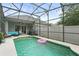 Enclosed pool area with string lights, patio, and outdoor seating perfect for relaxing at 14131 Paradise Tree Dr, Orlando, FL 32828