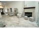 Spacious living room showcasing a cozy fireplace and comfortable seating at 1474 Thornhill Cir, Oviedo, FL 32765