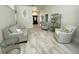 Open living room featuring beautiful tile flooring and neutral decor at 1474 Thornhill Cir, Oviedo, FL 32765