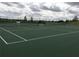 Well-maintained tennis court with new nets, ideal for enjoying a friendly match at 15157 Pigeon Plum Ln, Winter Garden, FL 34787
