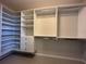 Spacious walk-in closet with custom shelving and hanging storage at 15157 Pigeon Plum Ln, Winter Garden, FL 34787