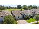 Charming home featuring a well-manicured lawn, lovely landscaping, and beautiful golf course views at 1925 Estuary Ln, Kissimmee, FL 34747