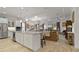 Spacious open floor plan showcases the kitchen, dining area, and living room with seamless flow at 1925 Estuary Ln, Kissimmee, FL 34747