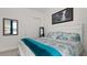 Comfortable main bedroom features a queen-sized bed and a sliding closet door at 1925 Estuary Ln, Kissimmee, FL 34747