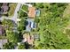 Aerial view of the houses with pools and tree coverage at 210 Lonesome Pine Dr, Longwood, FL 32779