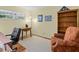 Well-lit office space with a desk, chair, and shelving at 210 Lonesome Pine Dr, Longwood, FL 32779