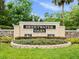 Community entrance sign with stone and landscaping at 210 Lonesome Pine Dr, Longwood, FL 32779