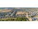 Wide aerial shot presenting a neighborhood full of single Gathering homes and green landscape at 2380 Kaley Ridge Rd, Clermont, FL 34715