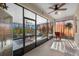 Spacious screened lanai with comfortable seating, and a full view of nature at 2380 Kaley Ridge Rd, Clermont, FL 34715