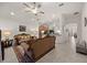 Spacious living room offering an open concept layout and a view into the kitchen at 2380 Kaley Ridge Rd, Clermont, FL 34715