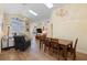 Spacious living room featuring vaulted ceilings, skylights, and wood flooring at 2535 Oneida Loop, Kissimmee, FL 34747