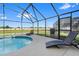 Relaxing pool with poolside grill and lounge chairs offers a great view at 2535 Oneida Loop, Kissimmee, FL 34747