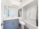 This bathroom features a new vanity and updated shower and tub at 2601 Spring Hill Dr, Kissimmee, FL 34743