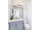 Bathroom featuring a new vanity, quartz countertop and updated fixtures at 2601 Spring Hill Dr, Kissimmee, FL 34743