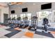 Well-equipped fitness center with treadmills, ellipticals, and televisions for entertainment at 2618 Calistoga Ave, Kissimmee, FL 34741