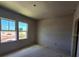 A bedroom with two windows is ready to be finished at 2963 Embark Trail, St Cloud, FL 34771