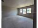 A bedroom with three windows is ready to be finished at 2963 Embark Trail, St Cloud, FL 34771