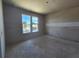 Unfinished bedroom featuring two windows that provide ample natural light at 2963 Embark Trail, St Cloud, FL 34771