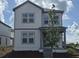 Charming two-story home with gray siding and welcoming front porch at 2963 Embark Trail, St Cloud, FL 34771