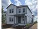 Attractive two-story home with gray siding and classic architectural details at 2963 Embark Trail, St Cloud, FL 34771