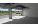 Bright garage with automatic door and ample space for parking and storage at 2963 Embark Trail, St Cloud, FL 34771