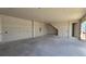 Unfinished garage with blank canvas, prepped for customization with an entrance door at 2963 Embark Trail, St Cloud, FL 34771