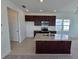 Open-concept kitchen with stainless steel appliances and granite countertops at 2963 Embark Trail, St Cloud, FL 34771