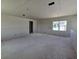 Unfinished living room with blank canvas, prepped for customization with natural light from a window at 2963 Embark Trail, St Cloud, FL 34771