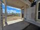 Covered patio showing exterior space with a sliding glass door leading inside the home at 2963 Embark Trail, St Cloud, FL 34771