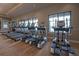 Well-equipped fitness center with treadmills and elliptical machines near large bright windows at 3041 Cardillino Way, Kissimmee, FL 34741