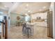 Spacious kitchen featuring a large island, white cabinets, and stainless steel appliances, great for entertaining at 3041 Cardillino Way, Kissimmee, FL 34741