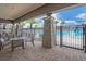 Inviting poolside patio area with tables, chairs, and views of the community pool and water slide at 3041 Cardillino Way, Kissimmee, FL 34741