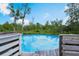 Fenced-in above ground pool provides a refreshing oasis on hot summer days at 30746 Fairview Ave, Tavares, FL 32778