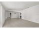 Spacious living room with light tile floors, white walls and lots of natural light at 3137 East St, Oviedo, FL 32765