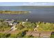 Waterfront homes feature private boat docks and serene water views from an aerial perspective at 3216 John Anderson Dr, Ormond Beach, FL 32176