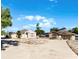 Lovely single-story home boasts a circular driveway and well-maintained landscaping under a clear blue sky at 4705 Beggs Rd, Orlando, FL 32810
