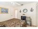 Welcoming bedroom with a queen bed, side tables, and decorative wall art, offering a comfortable and stylish space at 4723 Cherokee Rose Dr, Orlando, FL 32808