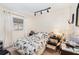 Functional bedroom with a queen bed and window with natural light and side tables at 4723 Cherokee Rose Dr, Orlando, FL 32808