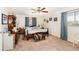 Cozy bedroom showcasing a comfortable bed, matching nightstands, and window with natural light at 4723 Cherokee Rose Dr, Orlando, FL 32808