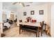 Bright dining room with tile floors and access to the living room at 4723 Cherokee Rose Dr, Orlando, FL 32808