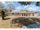 Charming home with a well-maintained front yard and covered entryway at 4723 Cherokee Rose Dr, Orlando, FL 32808