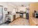 Functional kitchen with stainless steel appliances, tile floors, and ample counter space at 4723 Cherokee Rose Dr, Orlando, FL 32808