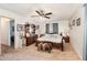 Comfortable main bedroom features an inviting bed, dresser with decor, and a peaceful ambiance at 4723 Cherokee Rose Dr, Orlando, FL 32808