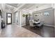 Elegant dining room featuring a large table, decorative hutch, and stylish decor at 4932 Eastlake Vista Dr, St Cloud, FL 34771