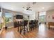 Entertainment area with bar seating, built-in bar, and comfortable layout at 4932 Eastlake Vista Dr, St Cloud, FL 34771