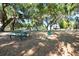 Community picnic area with shaded tables and lush green surroundings at 4932 Eastlake Vista Dr, St Cloud, FL 34771